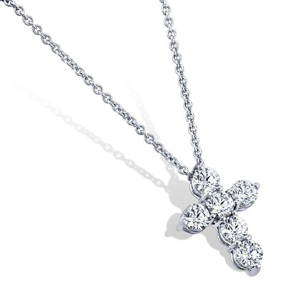 Custom made six diamond cross featuring 1.50 carats total weight in round brilliant cut diamonds set in platinum with a 1.3mm round adjustable cable chain.