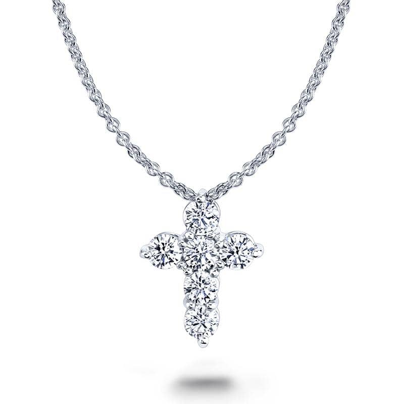 Custom made six diamond cross featuring .61 carats total weight in round brilliant cut diamonds set in platinum with a 1.3mm round adjustable cable chain.