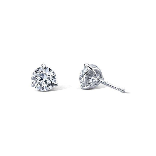 Diamond stud earrings featuring 1.50 carats total weight in round brilliant cut diamonds set in 18k white gold.