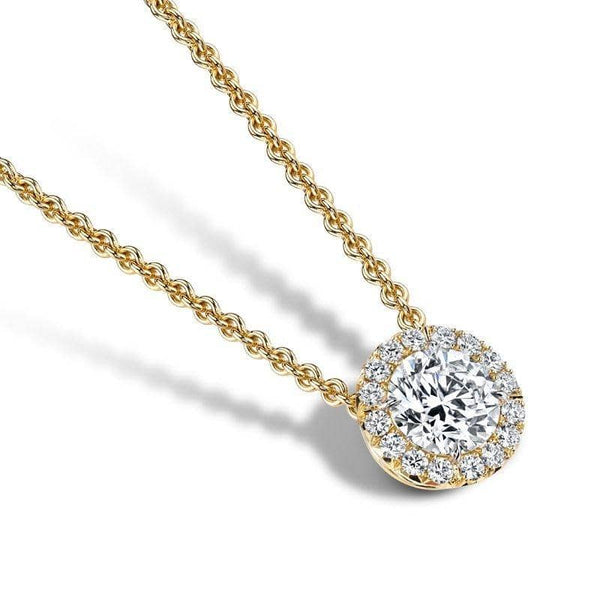 Hand crafted necklace featuring a 2.00 carat round brilliant cut diamond center stone surrounded by .36 carats total weight in accent diamonds set in 18 yellow gold.