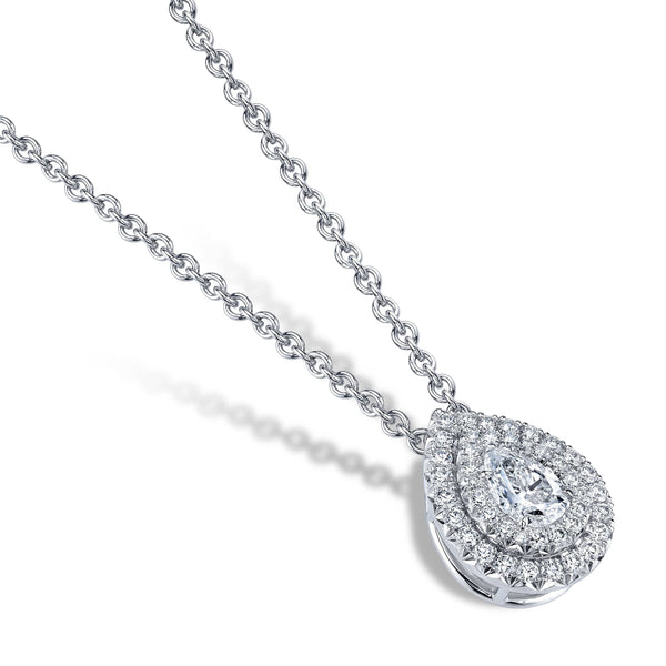 Hand crafted diamond pendant featuring a .77 carat pear shaped center and .54 carats total weight in accent diamonds set in platinum.