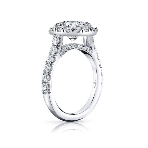 Custom made platinum ring featuring a 2 1/2 ct round brilliant cut center including 1.22 carats total weight in accent diamonds.