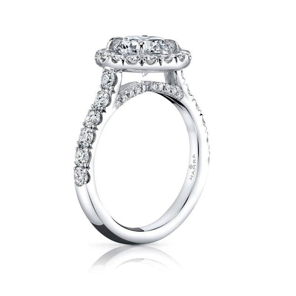 Custom made platinum ring featuring a 1.75ct round brilliant cut diamond center including .93 carats total weight in round brilliant accent diamonds.