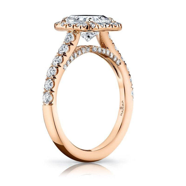 Custom made ring featuring a 1 1/2 ct cut cornered rectangular modified brilliant radiant cut diamond including .82 carats total weight in accent diamonds set in 18k rose gold.