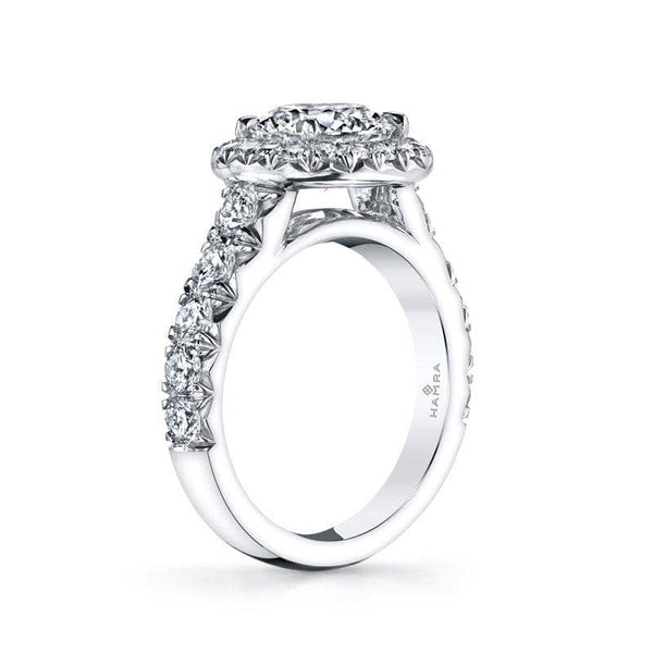  ring featuring a Forevermark 2.12 carat round brilliant cut center diamond with 1.32 carats total weight in accent diamonds set in platinum.