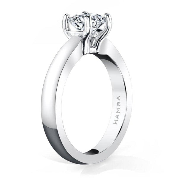 Solitaire ring featuring a 1.00 carat round brilliant cut diamond set in platinum.
