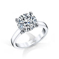 Solitaire ring featuring a 4.00 ct. round brilliant cut diamond set in platinum.