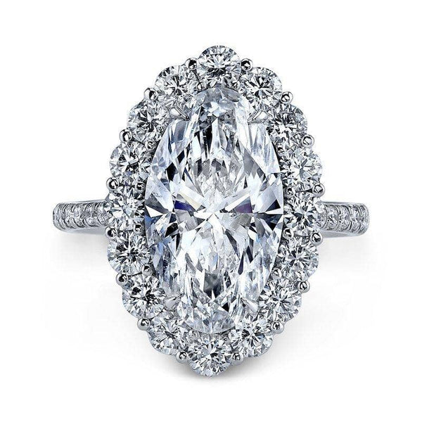  ring featuring a 4.20 carat moval shaped center diamond with 1.19 carats total in round accent diamonds and .24 carats total in pave diamonds set in 18k white gold.
