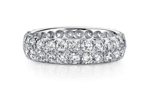 Custom made three row diamond band featuring 3.18 carats total weight in round brilliant cut diamonds set in platinum.