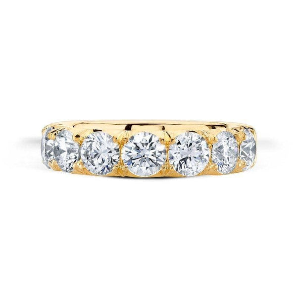 Custom made seven diamond band featuring 2.54 carats total weight in round brilliant cut diamonds set in 18k yellow go