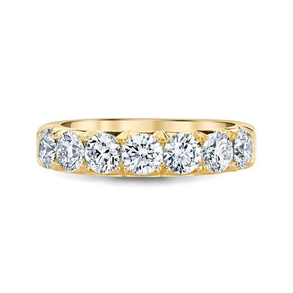 Custom made French set 7 stone band featuring 1.75 carats total weight in round brilliant cut diamonds set in 18k yellow gold.